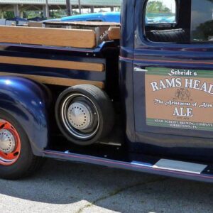 Blue pickup truck with Rams Head Ale ad.